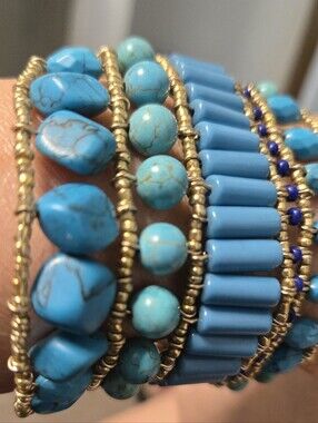 Multi- strand bracelet with turquoise- like beads and blue barrel beads By Chico